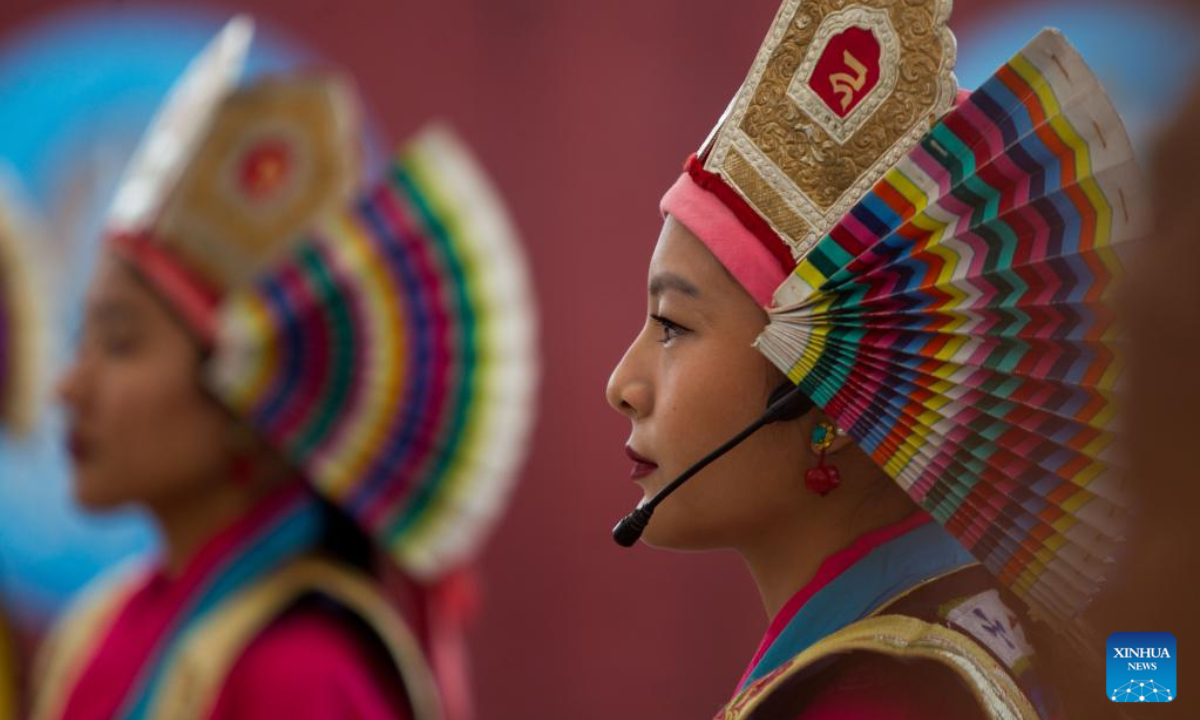 A girl in traditional attire performs during the celebration of Gyalpo Lhosar Festival at Boudha in Kathmandu, Nepal, Feb 23, 2023. Photo:Xinhua