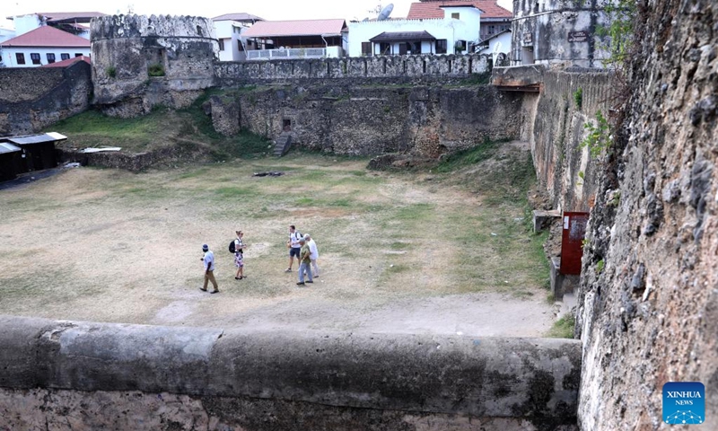 This photo taken on Feb. 26, 2023 shows the Old Fort in the Stone Town of Zanzibar, Tanzania. The Stone Town of Zanzibar used to be the capital of the Sultanate of Zanzibar. It is a melting pot of various African, Asian and European cultures. In 2000, the historical town was listed as a UNESCO World Cultural Heritage site.(Photo: Xinhua)