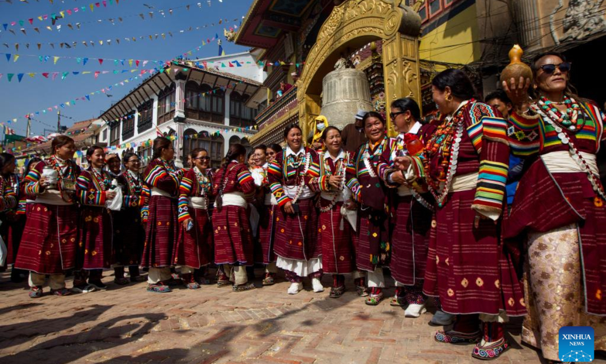 Women in traditional attire are seen during the celebration of Gyalpo Lhosar Festival at Boudha in Kathmandu, Nepal, Feb 23, 2023. Photo:Xinhua