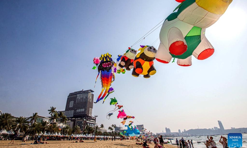 Kites are pictured above the beach in Pattaya, Thailand, Feb. 27, 2023. Kite enthusiasts and tourists gathered at Pattaya Beach to enjoy the international kite festival.(Photo: Xinhua)