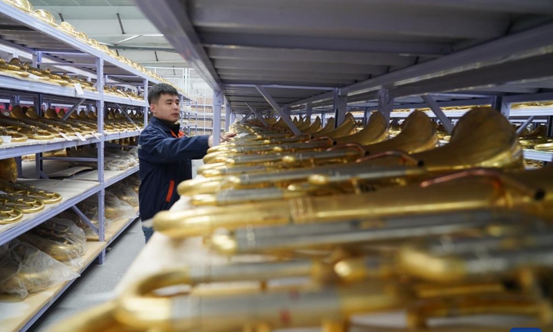 A worker counts the number of semi-finished musical instruments at a manufacturer in Wuqiang County, north China's Hebei Province, on Feb. 23, 2023.

There are 63 musical instrument manufacturers in Wuqiang County, employing more than 10,000 people. More than 400 types of musical instruments are produced in the county and are sold to more than 80 countries and regions. (Xinhua/Mu Yu)