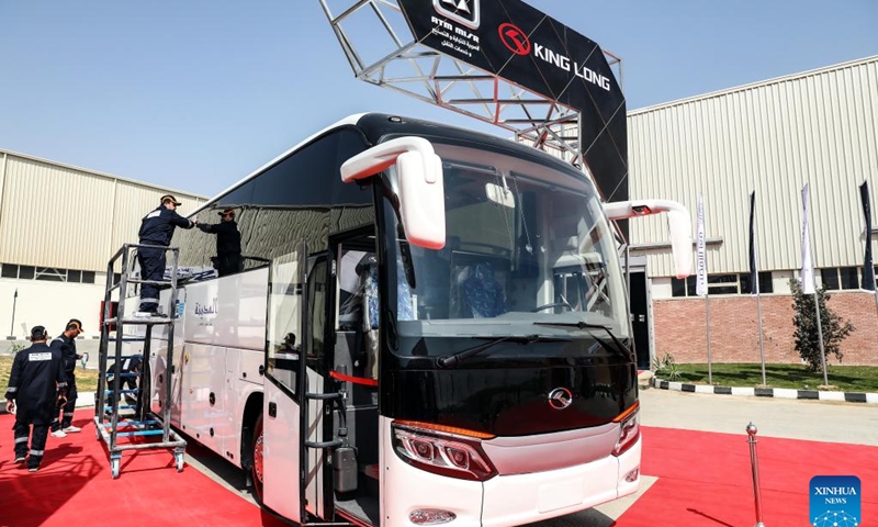 Employees work at a bus assembly plant co-built by Chinese and Saudi firms in Suez Governorate, Egypt, on Feb. 28, 2023. A new bus assembly plant co-built by Chinese and Saudi firms has started production in New Suez City, with the first batch of transport buses expected to roll off the assembly line soon.(Photo: Xinhua)