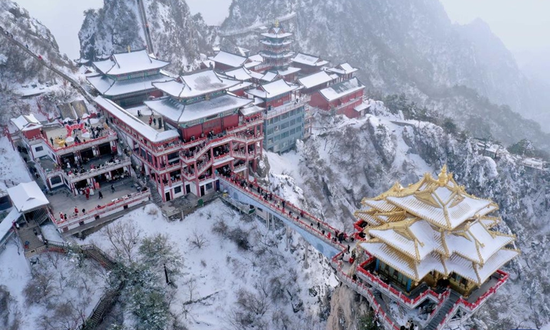 This aerial photo taken on Feb. 23, 2023 shows the scenery of the Laojun Mountain scenic spot in Luanchuan County of Luoyang, central China's Henan Province. Official data showed that the city saw 10.31 million trips in January of 2023, generating 6.28 billion yuan (about 902.44 million U.S. dollars) in revenue, up 746.63 percent and 690.06 percent year on year respectively(Photo: Xinhua)