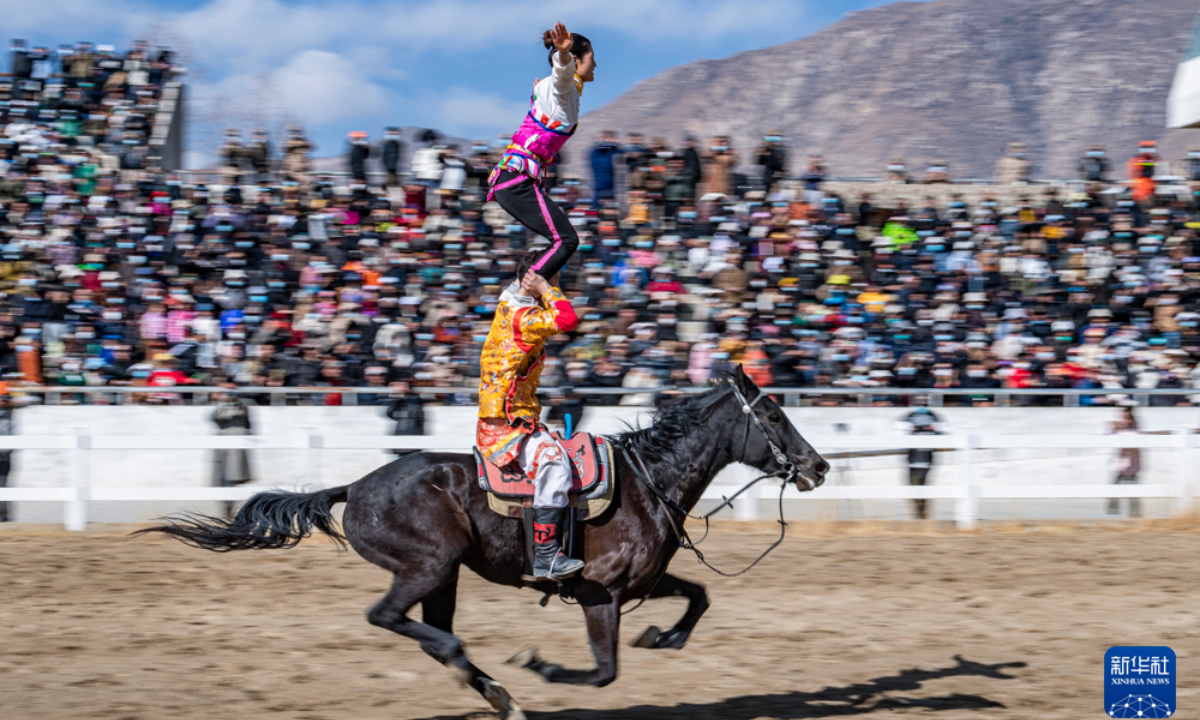 Riders on horseback perform during an equestrian show in Lhasa, southwest China's Tibet Autonomous Region, Feb 23, 2023. An annual equestrian show was held here on Thursday to celebrate the Tibetan New Year. Photo:Xinhua