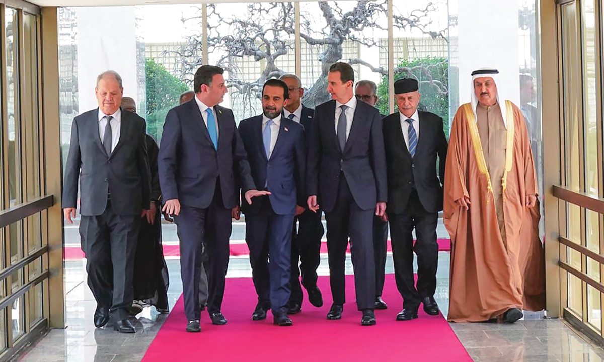 Syrian President Bashar Assad (third right) meets with a delegation representing various parliaments of Arab countries in Damascus, Syria on February 26, 2023. The visit follows a mini-summit in Baghdad, Iraq, that affirmed the Arab League's intention of having Syria return to the organization despite the country's devastating civil war in a sign of thawing ties.Photo: VCG