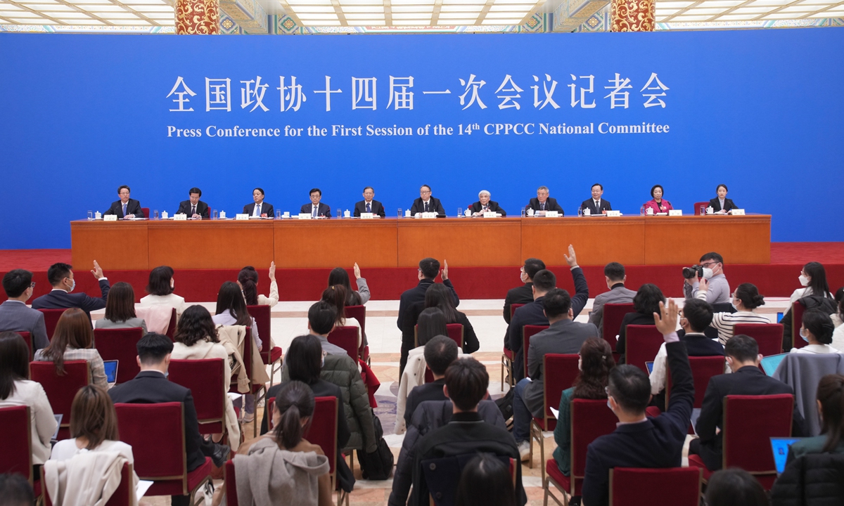 Heads of the central committees of the non-Communist political parties and the All-China Federation of Industry and Commerce attend a press conference during the first session of the 14th National Committee of the Chinese People's Political Consultative Conference (CPPCC) in Beijing on March 5, 2023.?Photo: Xinhua