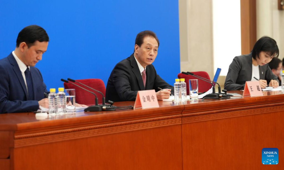 Wang Chao (C), spokesperson for the first session of the 14th National People's Congress (NPC), attends a press conference at the Great Hall of the People in Beijing, capital of China, March 4, 2023. Photo:Xinhua