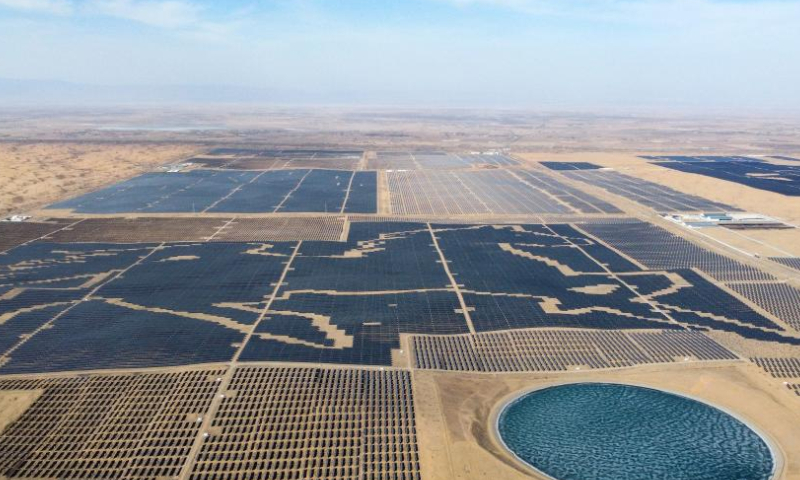 This aerial photo taken on March 3, 2023 shows a view of the photovoltaic power base in Dalad Banner, Erdos, north China's Inner Mongolia Autonomous Region. Located in the east of Kubuqi Desert, a photovoltaic power base has been built in Dalad Banner with an installed capacity of 1 million kilowatts, generating about 2 billion kWh of electricity yearly. (Xinhua/Bei He)