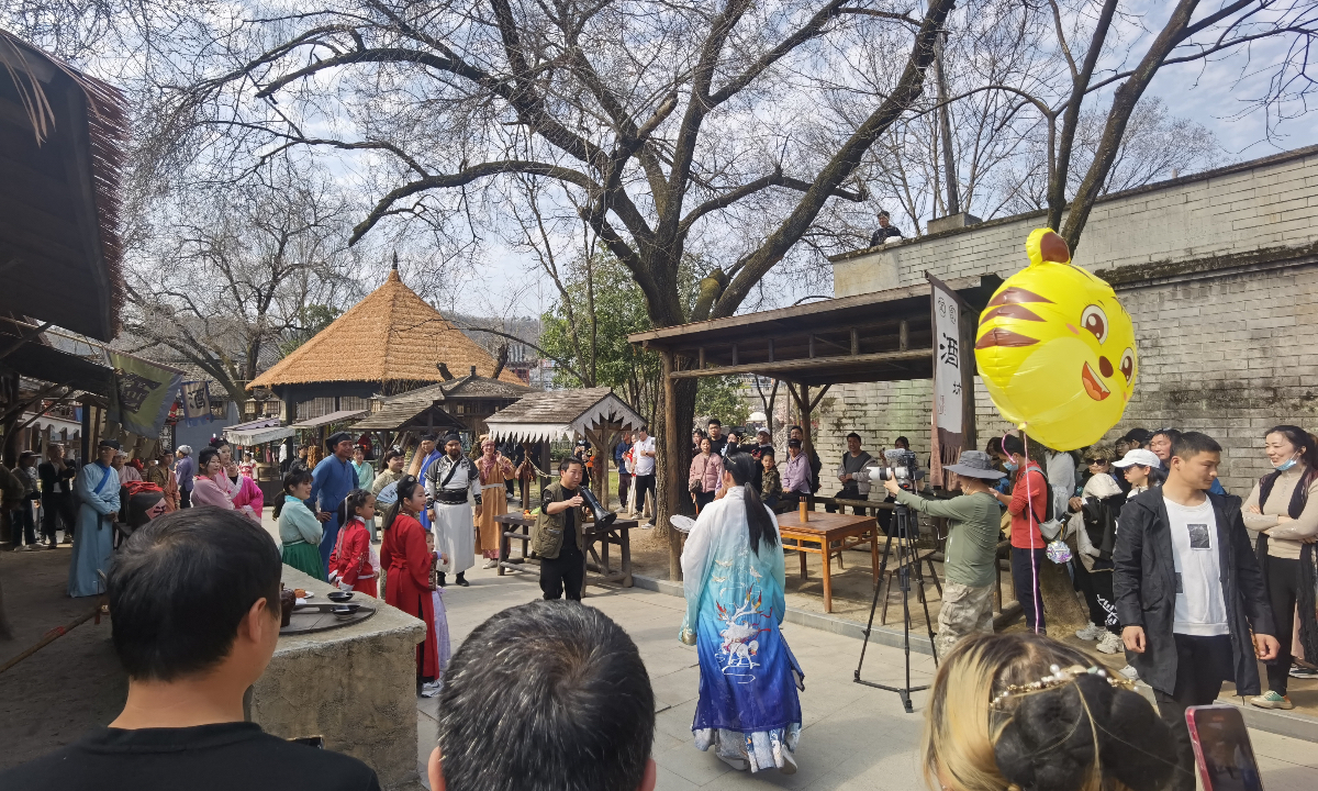 Tourists take part in an immersive acting experience at Hengdian World Studios in East China’s Zhejiang Province. Photo: Courtesy of the Comprehensive Coordination Office of the Hengdian Film and Television Culture Industrial Cluster