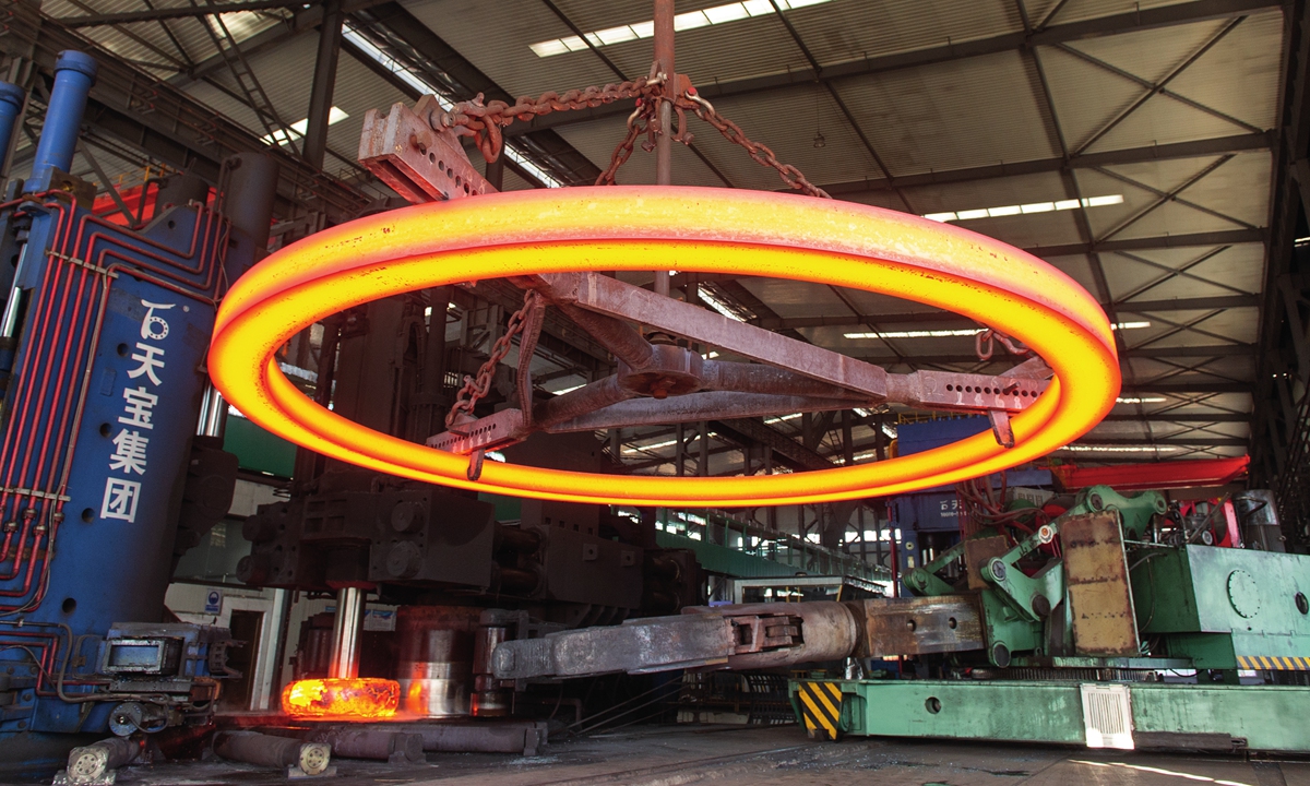 A flange used for wind power turbine is shaped at Shanxi Tianbao Group. Photo: Courtesy of Dingxiang Bureau of Industry and Information Technology