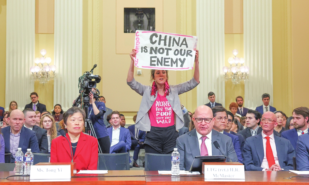 A protester from Code Pink interrupts former US national security adviser H. R. McMaster as he testifies during the first hearing held by the US' House China Select Committee in Washington on February 28, 2023. Photo: VCG