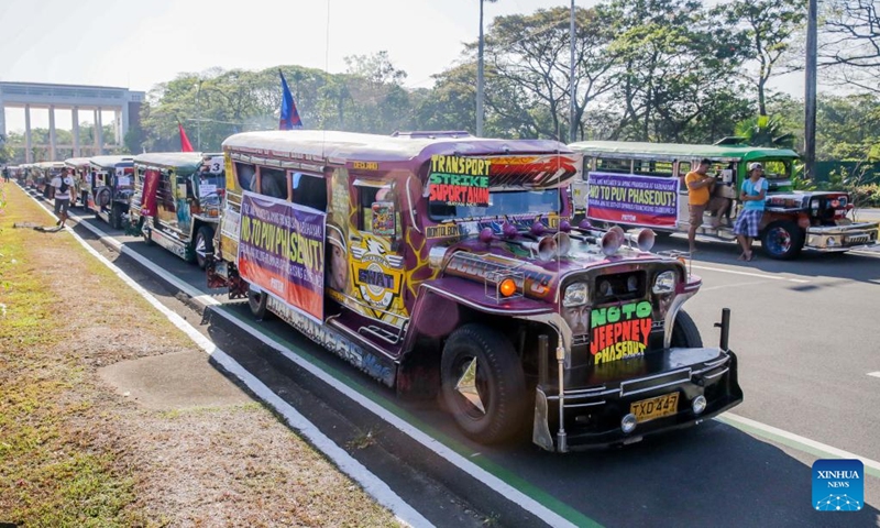 Jeepneys are seen during a nationwide transport strike against the proposed jeepney phaseout in Quezon City, the Philippines, March 6, 2023. Various public utility jeepney transport groups kicked off a week-long nationwide transport strike despite the Philippine government's decision to move to December this year the deadline of the phasing out of jeepneys, the country's public transportation symbol, as part of the Public Utility Vehicle Modernization Program.(Photo: Xinhua)
