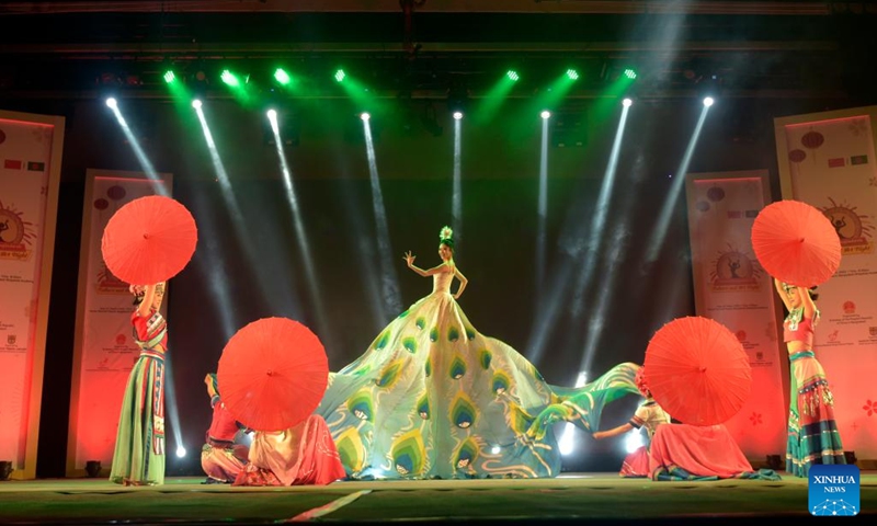 Artists of Kunming National Song & Dance Theater perform during the China-Bangladesh Culture & Art Night in Dhaka, Bangladesh, March 4, 2023. The China-Bangladesh Culture & Art Night, organized by the Chinese embassy in Bangladesh, was presented by Kunming National Song & Dance Theater, with the support of Bangladesh Shilpakala Academy or BSA (the Bangladeshi national academy of fine and performing arts).(Photo: Xinhua)