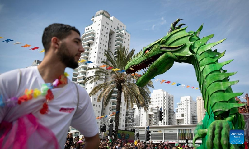 A man participates in Adloyada Holon Purim Parade 2023 in Holon, central Israel, on March 7, 2023. Purim is a Jewish holiday that commemorates the deliverance of the Jewish people from Haman's plot during the reign of the ancient Persian Empire, according to the Biblical Book of Esther.(Photo: Xinhua)