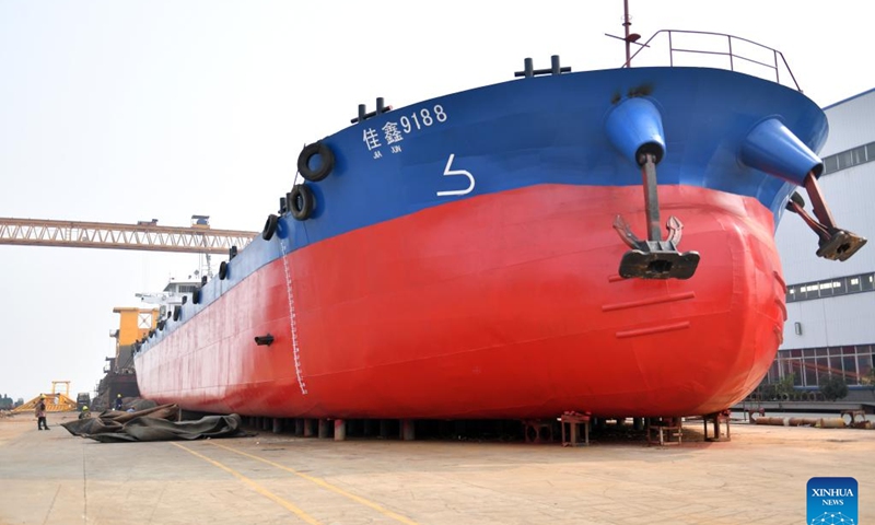 This photo taken on March 2, 2023 shows a cargo ship at a shipbuilding enterprise in Yuanjiang, central China's Hunan Province. Since this year, shipbuilding enterprises in Yuanjiang have been speeding up production, aiming for a good start in the first quarter.(Photo: Xinhua)