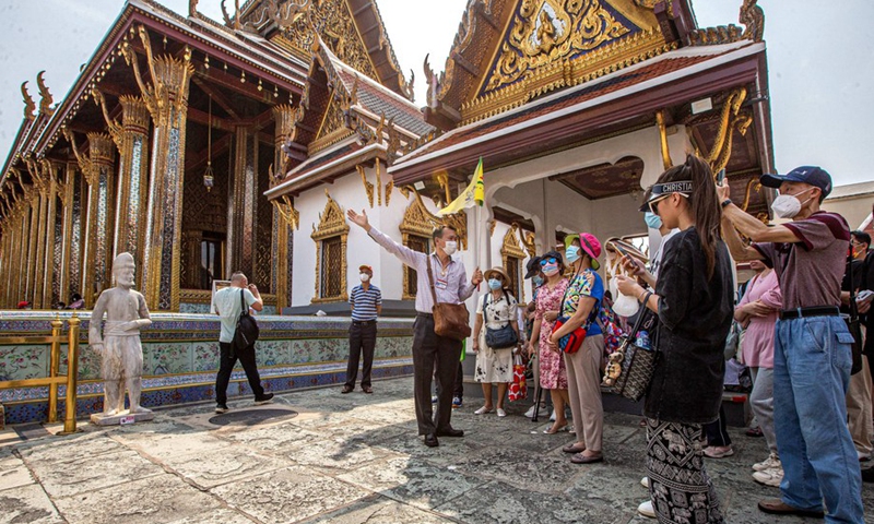 Chinese tourists visit the Grand Palace in Bangkok, Thailand on Feb. 7, 2022.(Photo: Xinhua)