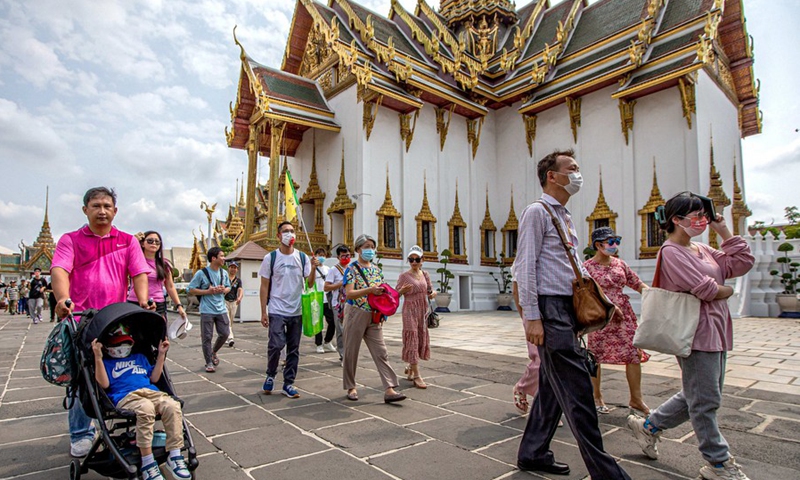 Chinese tourists visit the Grand Palace in Bangkok, Thailand on Feb. 7, 2022.(Photo: Xinhua)