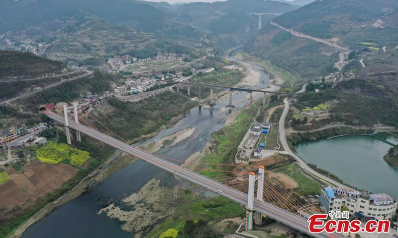 A high-speed train runs on a bridge of Chongqing to Guiyang railway in southwest China's Guizhou Province, March 16, 2023.  (Photo: China News Service) 