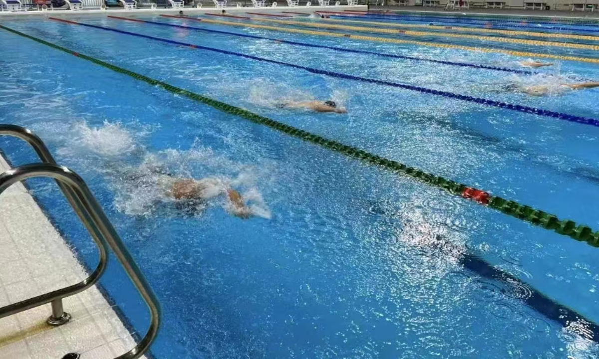 People are swimming at the sports center in Hohhot, North China North China's Inner Mongolia Autonomous Region. Photo: the Paper 