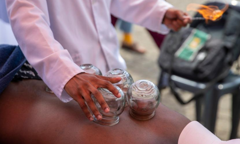 A student receives traditional Chinese cupping therapy at the University of Johannesburg in Johannesburg, South Africa, March 17, 2023. The university held a Chinese medicine promotion event on Friday. (Xinhua/Zhang Yudong)