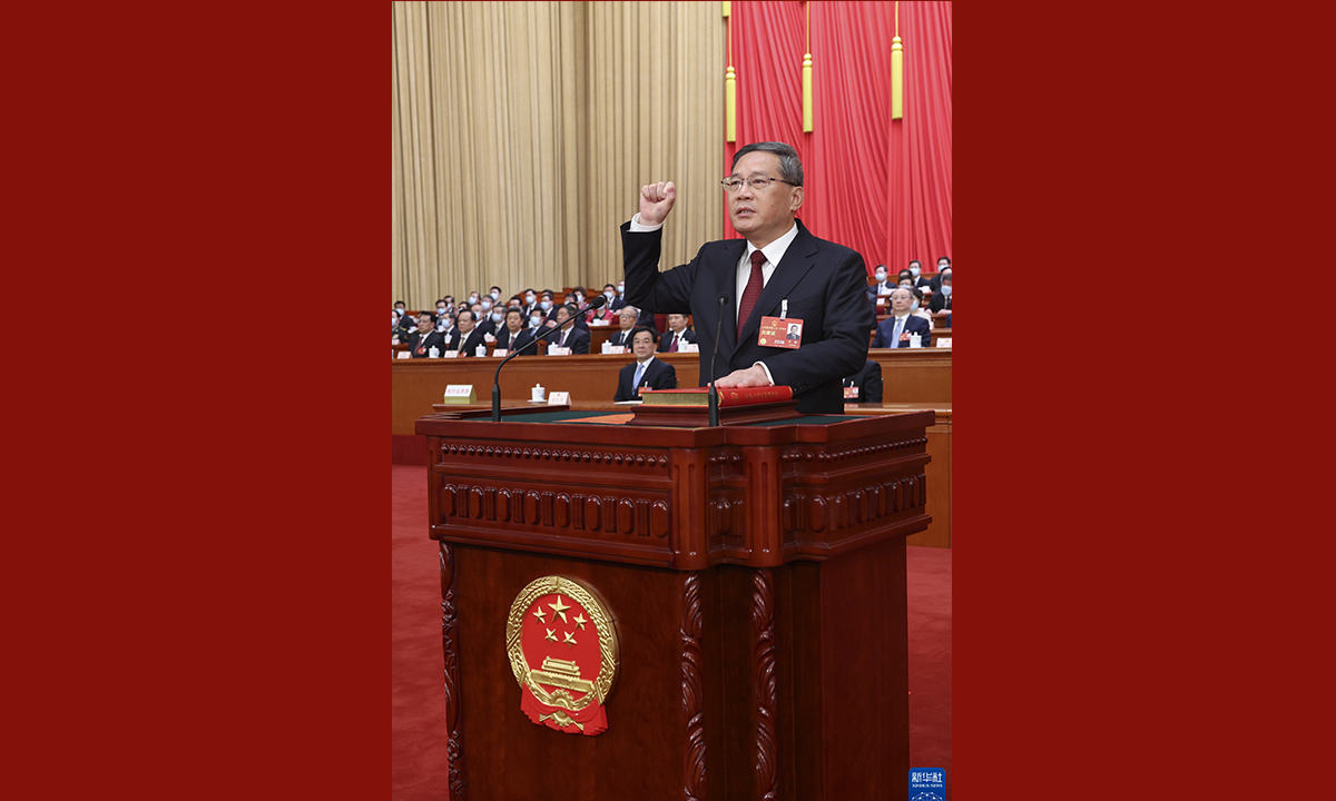 Newly appointed Chinese Premier Li Qiang makes a public pledge of allegiance to the Constitution at the Great Hall of the People in Beijing, capital of China, March 11, 2023. Li was endorsed as Chinese premier at a plenary meeting of the first session of the 14th National People's Congress, the country's national legislature. Photo:Xinhua
