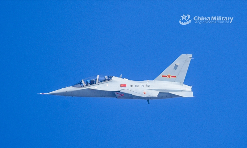 A pilot cadet assigned to a regiment of the Naval Aviation University flies a two-seat JL-10 trainer under the accompany of an instructor during a flight training exercise held in early February, 2023. (eng.chinamil.com.cn/Photo by Xu Yinglong)