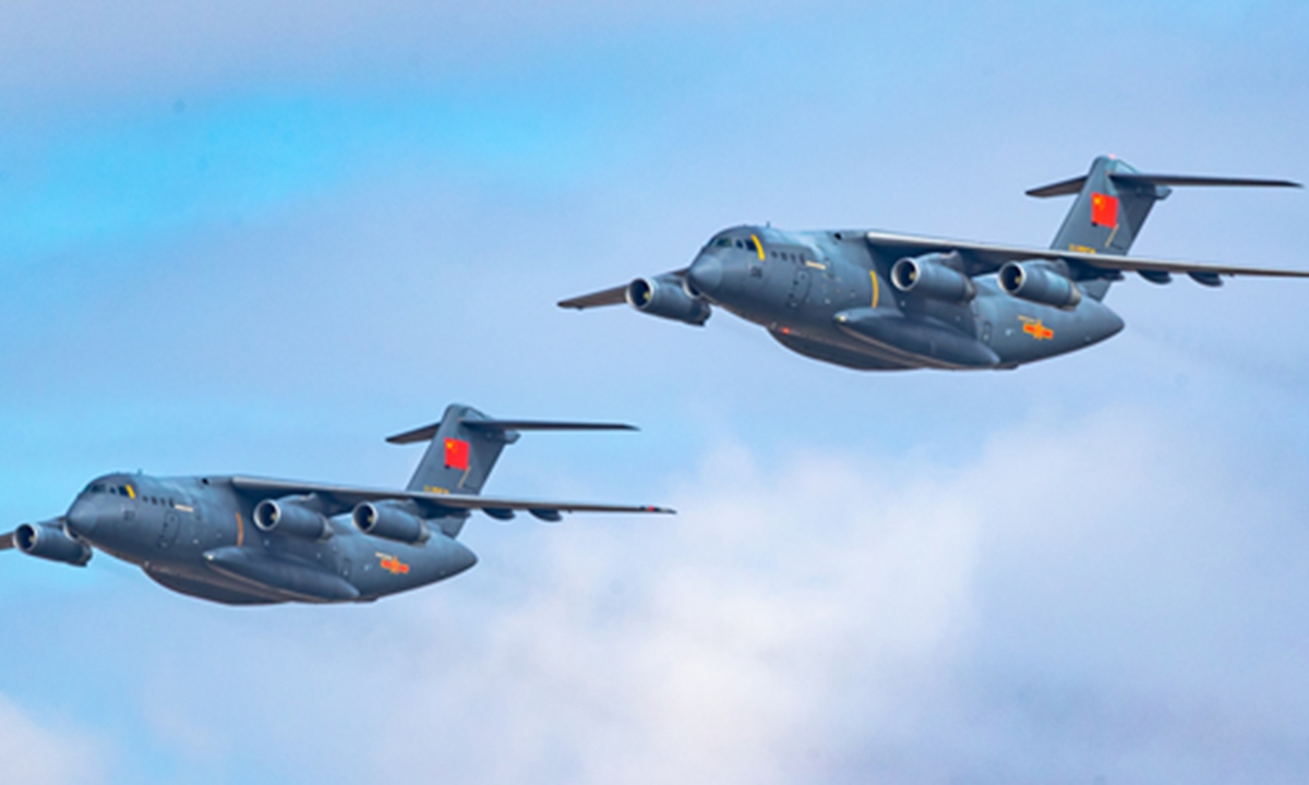 Two Y-20 large transport aircraft of the Chinese People's Liberation Army Air Force fly in formation. Photo: Courtesy of Aviation Industry Corporation of China