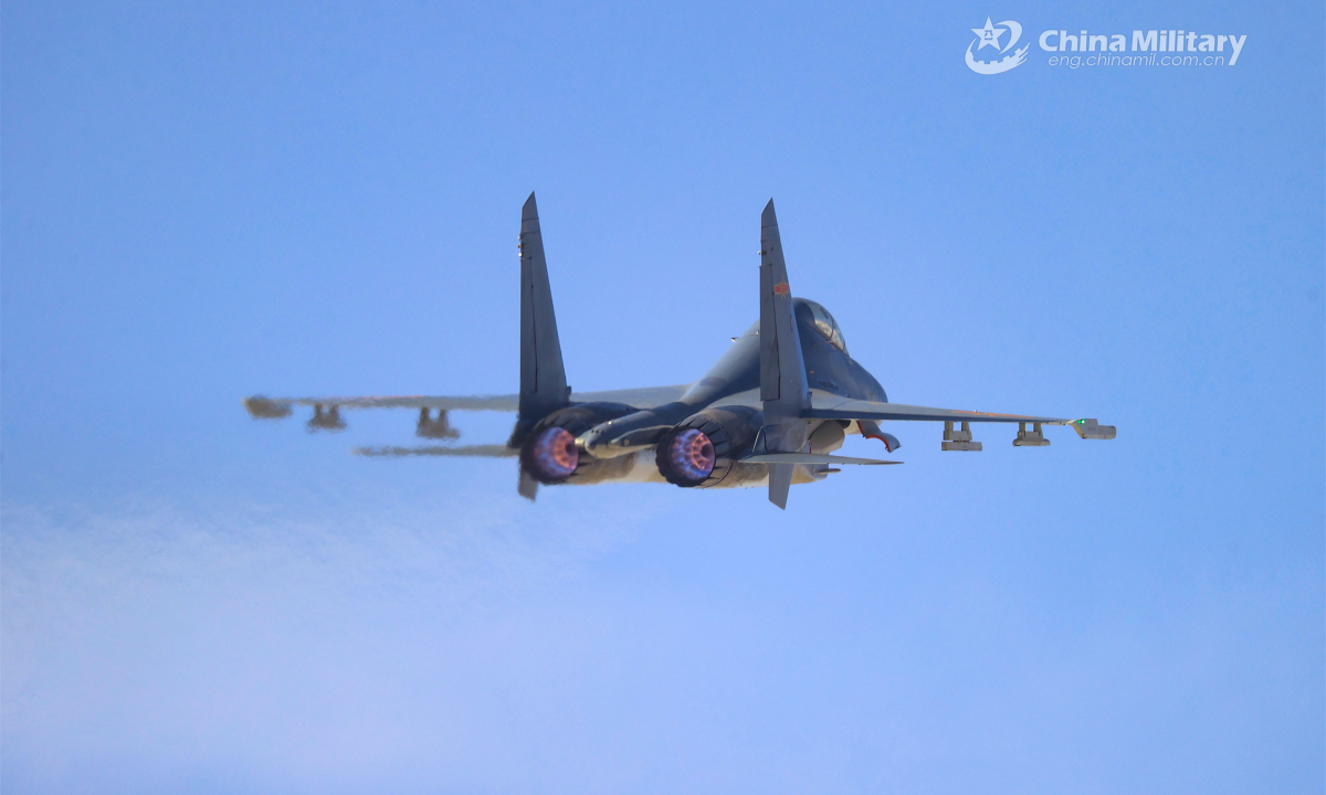 A fighter jet attached to an aviation brigade of the PLA Air Force soars into the sky during a high-intensity flight training exercise in early February, 2023. Photo: China Military