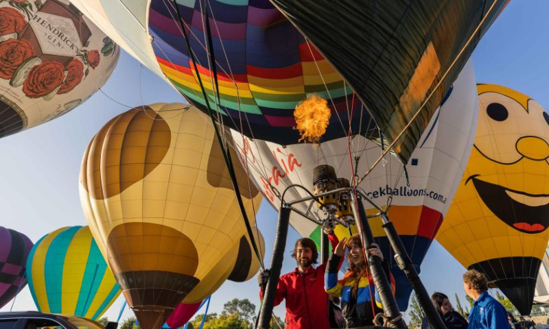 This photo taken on March 11, 2023 shows the annual Canberra Balloon Spectacular festival in Canberra, Australia. The annual Canberra Balloon Spectacular festival, a hot air balloon festival, is held this year from March 11 to 19. (Photo by Chu Chen/Xinhua)