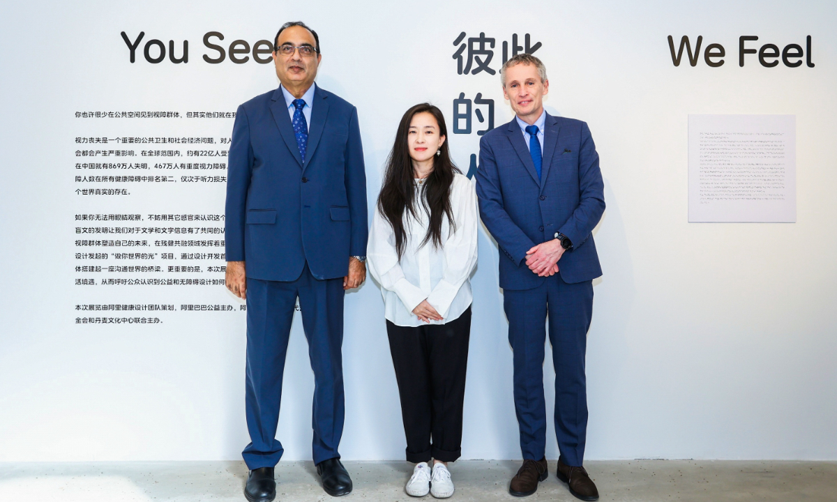 Danish Ambassador to China Thomas ?strup M?ller (right) at the exhibition's opening ceremony on March 10 Photo: Courtesy of the Danish Cultural Center