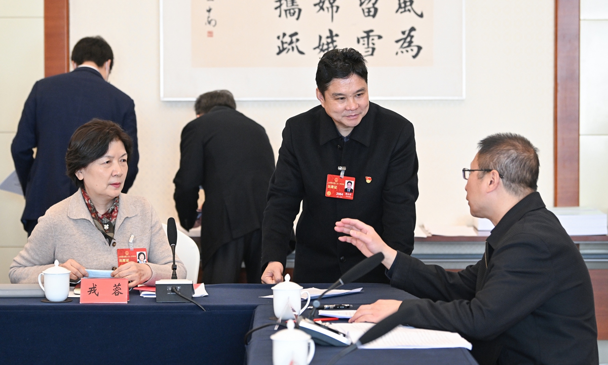 The Chongqing delegation to the first session of the 14th National People's Congress held a plenary meeting to review the government work report on March 6, 2023 during the ongoing two sessions in Beijing. Photo: VCG