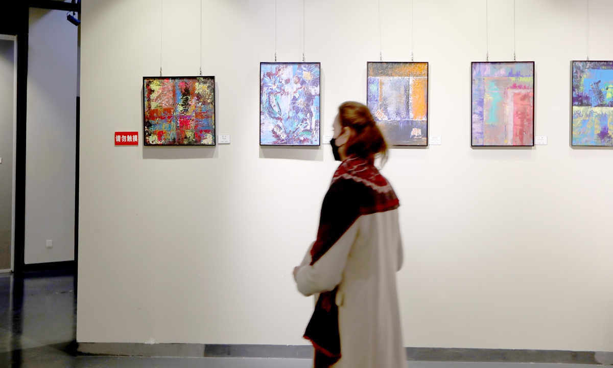 Anastasia makes the rounds during her exhibition in Shanghai. Photo: Chen Xia/Global Times