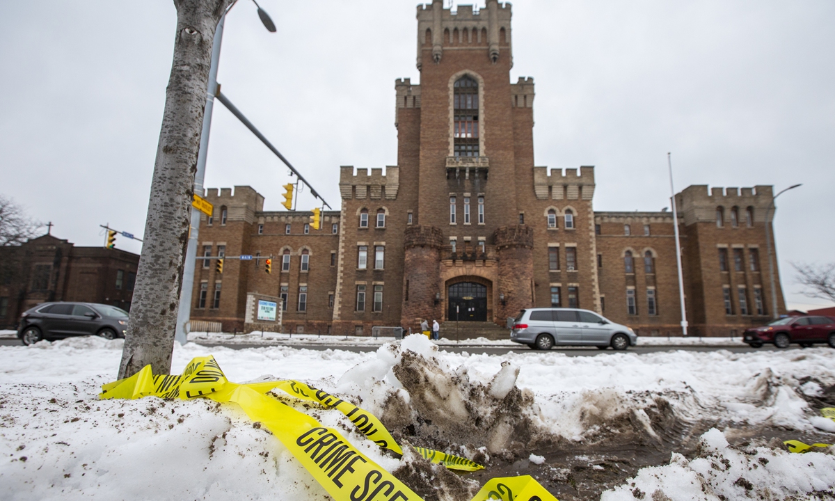 Police tape remains on the ground outside of the Main Street Armory on March 6, 2023, in Rochester, New York. A stampede took place after a concert which was held on that day, leading to two dead with eight others injured. Photo: VCG