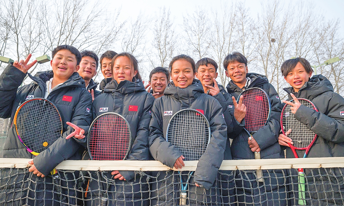 Young players from Wild Elephant Tennis Club take a photo at tennis court in Langfang, Hebei Province.Photo: Chen Tao/GT
