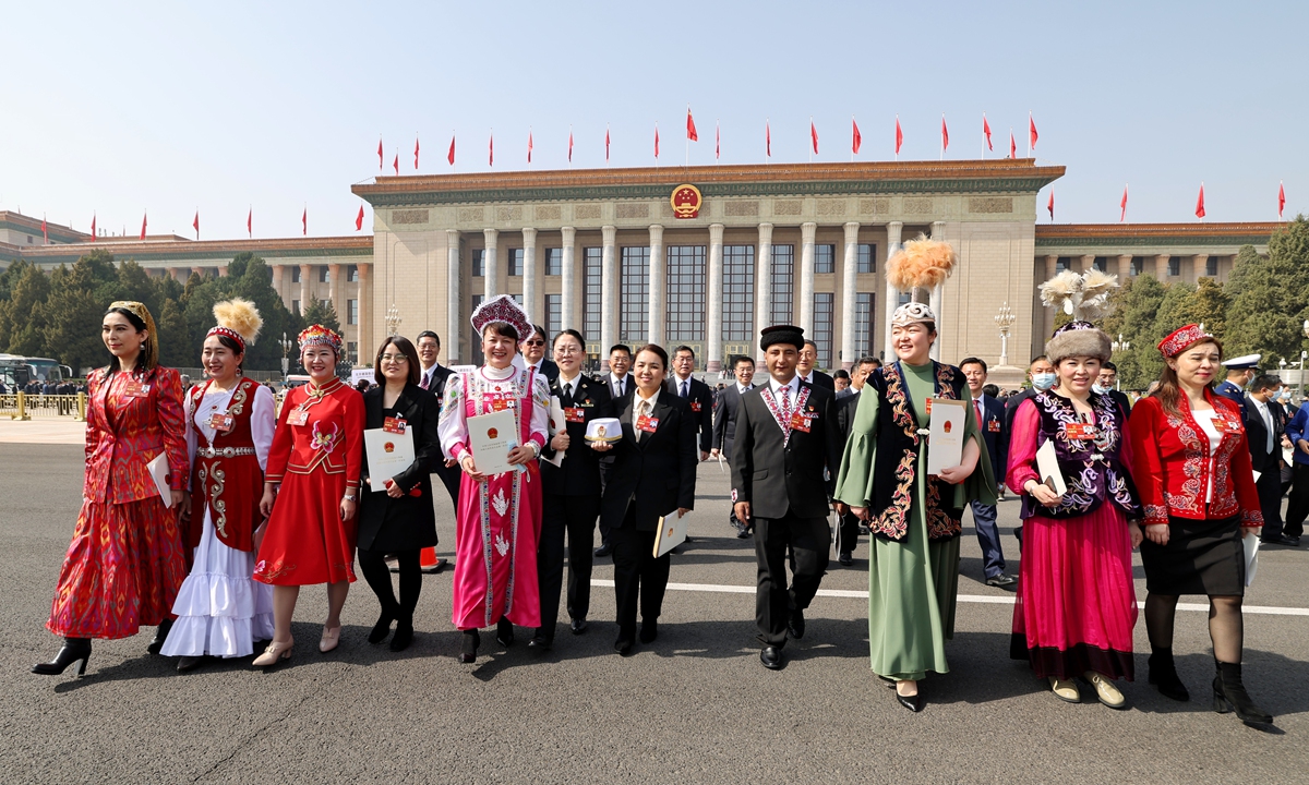 Deputies leave the Great Hall of the People after attending the third plenum of the first session of the 14th National People's Congress on March 10, 2023 in Beijing. Photo: VCG
