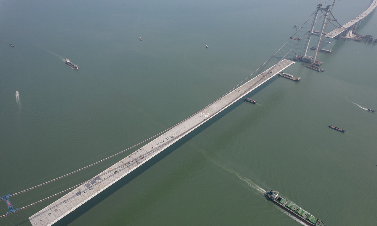 The Lingdingyang bridge, a key part of the Shenzhen-Zhongshan highway, is currently under construction in Zhongshan, South China's Guangdong Province on March 17, 2023. The 24-kilometer link is a mega project in the Greater Bay Area that will cut the travel time between the two cities from two hours to 30 minutes. Photo: VCG 