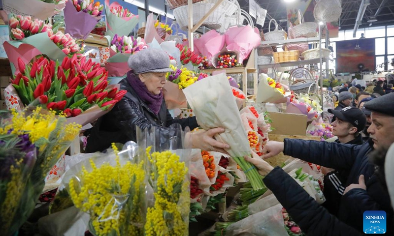 People visit a flower market on International Women's Day in Moscow, Russia, March 8, 2023.(Photo: Xinhua)