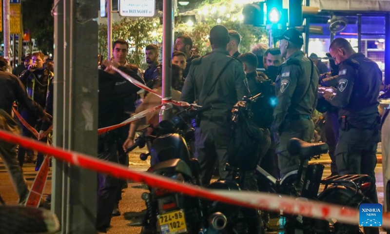 Police work at the scene of a shooting attack on Dizengoff street in Tel Aviv, Israel, on March 9, 2023. A gun-wielding Palestinian man opened fire on a busy street in the Israeli city of Tel Aviv on Thursday night, injuring three individuals in what was described by Israeli officials as a terror attack. (Photo: Xinhua)