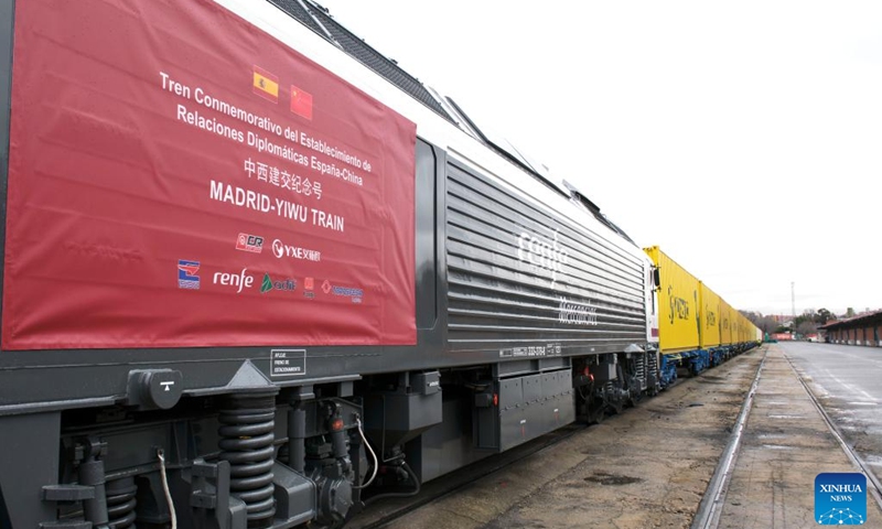 This photo taken on March 9, 2023 shows a freight train heading for Yiwu of China in Madrid, Spain. A freight train loaded with 70 standard containers of Spanish goods, including red wine and olive oil, departed from Madrid and headed for Yiwu on Thursday. The commemoration trip came as Thursday marked the 50th anniversary of diplomatic relations between China and Spain.(Photo: Xinhua)