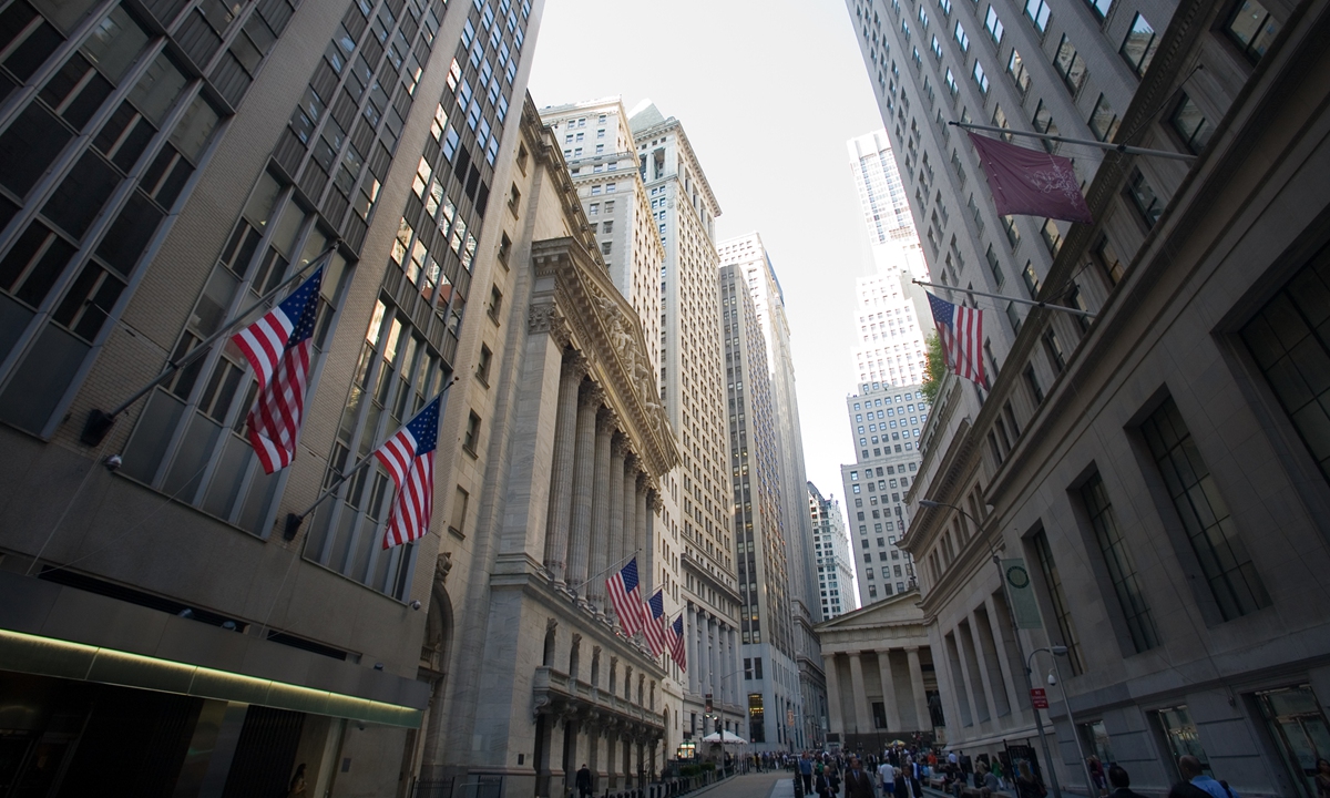 A view of Wall Street in New York, the US Photo: IC