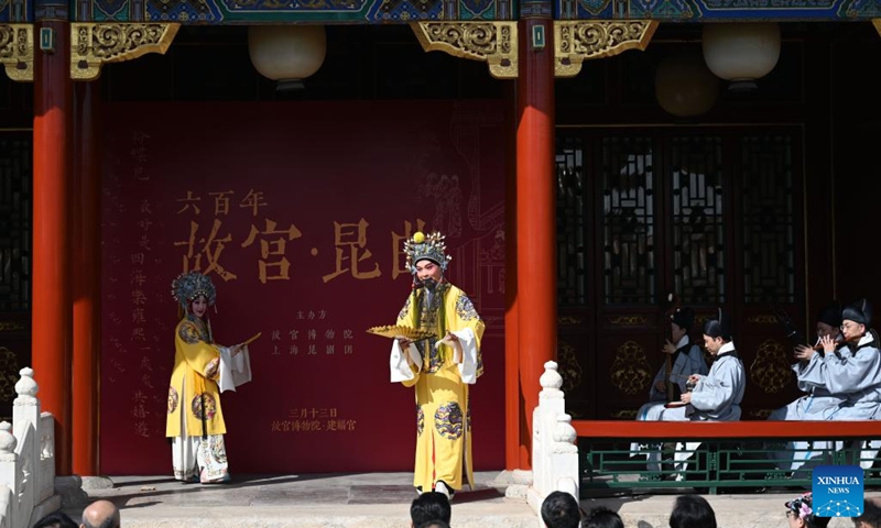 Kunqu opera performers Li An (2nd L) and Yu Bin enact in an excerpt of the traditional repertoire Palace of the Eternal Youth at the Palace Museum in Beijing, capital of China, March 13, 2023. The Palace Museum and Shanghai Kunqu Opera Troupe signed a strategic cooperation agreement here Tuesday to restage Chinese classic operas.(Photo: Xinhua)