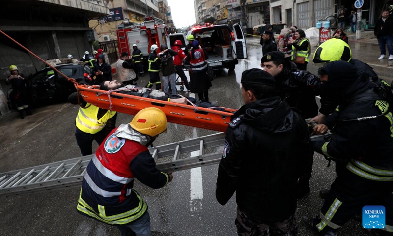 Members of Palestinian Civil Defense take part in an earthquake simulation in the West Bank city of Nablus, on March 14, 2023.(Photo: Xinhua)
