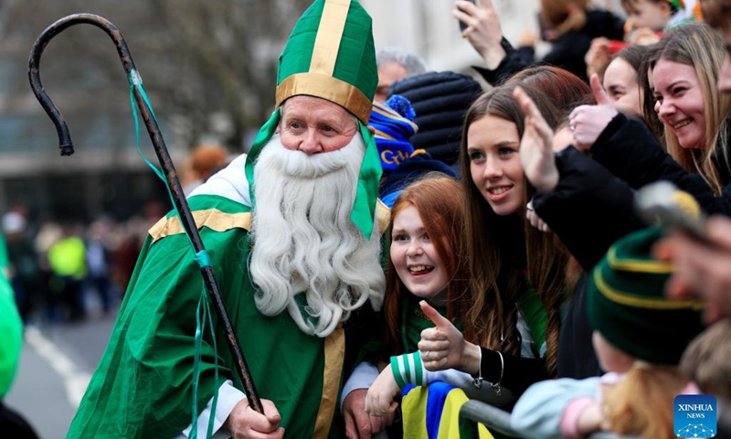 People attend the St. Patrick's Day Parade in London, Britain, on March 12, 2023.(Photo: Xinhua)