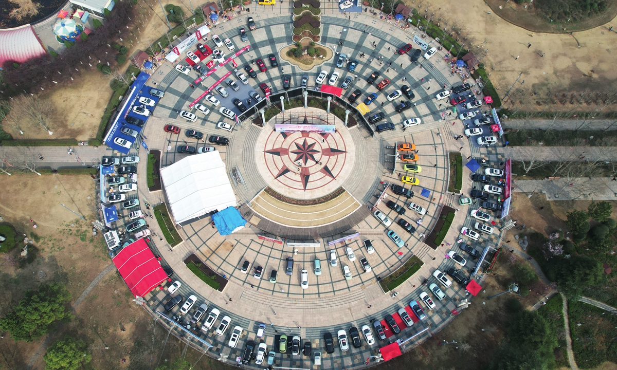 Citizens attend an auto show at a park in Lianyungang, East China's Jiangsu Province on March 11, 2023. Photo: VCG