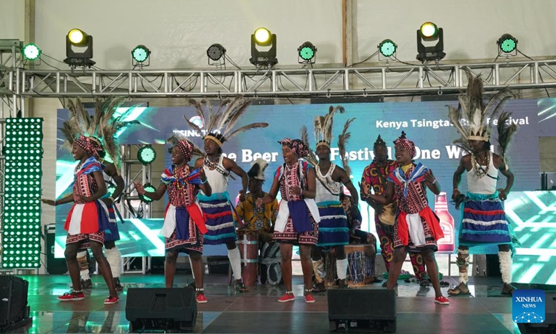 Artists perform traditional dance during the first Kenya Tsingtao Beer Festival in Nairobi, Kenya, March 11, 2023. The first Kenya Tsingtao Beer Festival was held here on Saturday. (Xinhua/Han Xu)