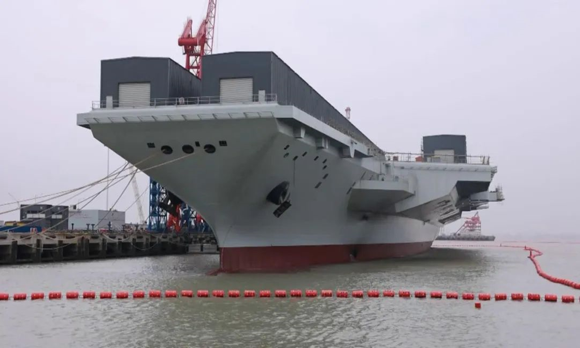 The Fujian, the third aircraft carrier of China, undergoes outfitting and mooring trials in Shanghai in early 2023. Photo: Screenshot from China Central Television