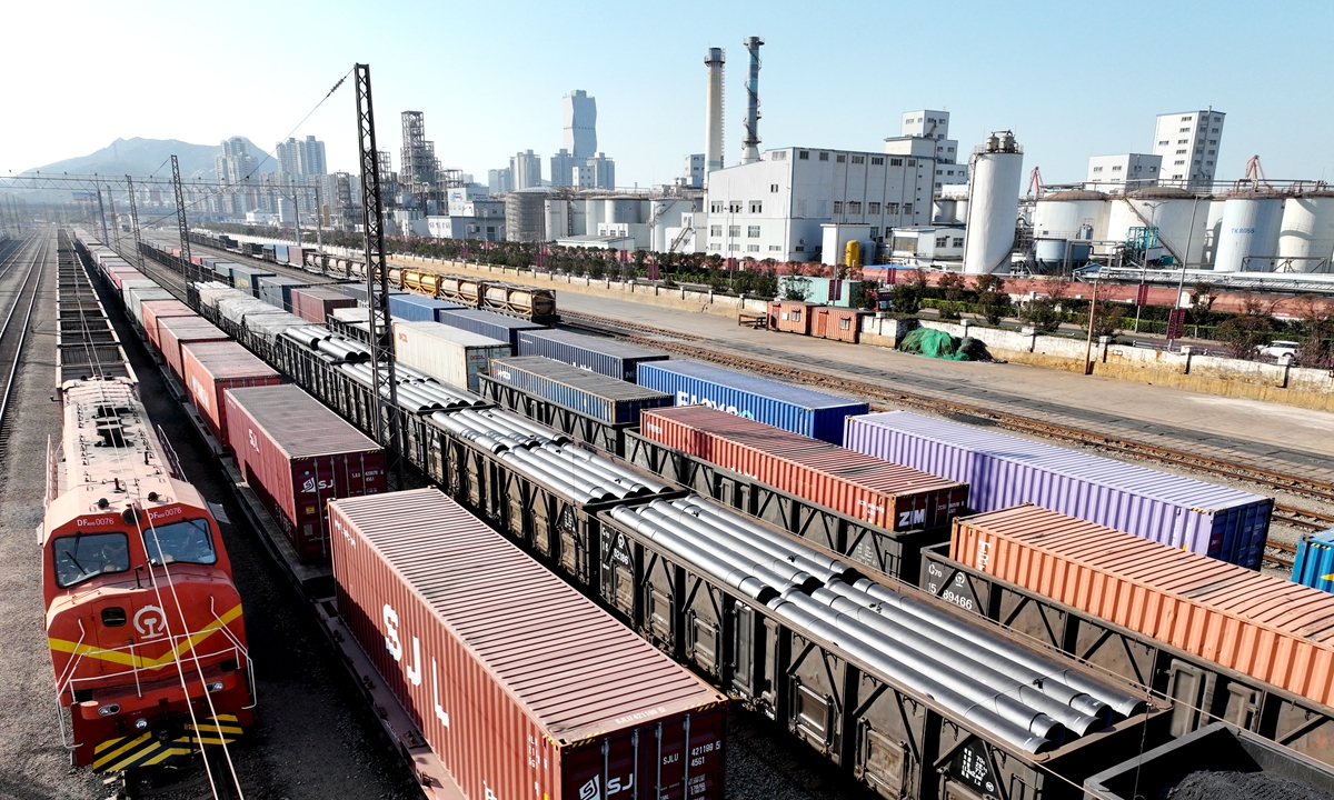 Cargo trains enter and exit the depot at Port of Lianyungang in East China's Jiangsu Province on March 14, 2023. Since its launch in 2014, the China-Kazakhstan Logistics Center at the port has cumulatively handled 5,000 China-Europe freight trains carrying more than 440,000 standard containers. Photo: VCG