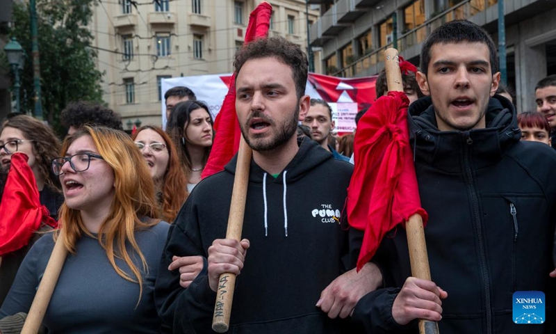 People take part in a demonstration in Athens, Greece, on March 16, 2023. Greece's public services, including transport, were paralyzed on Thursday by a 24-hour nationwide general strike called by labor unions over the deadly train accident last month.(Photo: Xinhua)