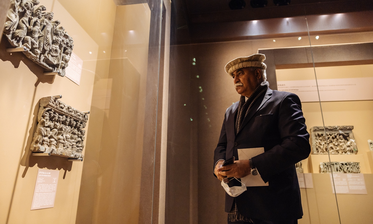 A visitor examines exhibits at the exhibition. Photo: Li Hao/GT