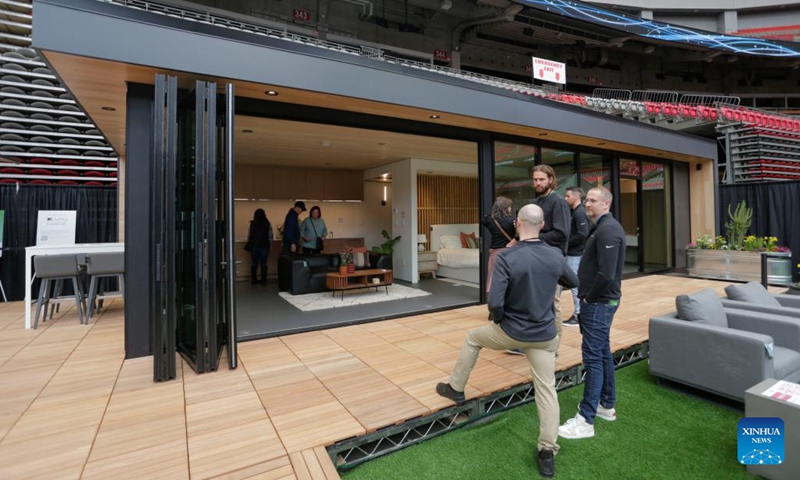 People view a modular home design at the BC Home and Garden Show in Vancouver, British Columbia, Canada, on March 16, 2023. The annual event featured over 300 exhibitors and expert presentations and will run from March 16 to March 19 at the BC Place stadium.(Photo: Xinhua)